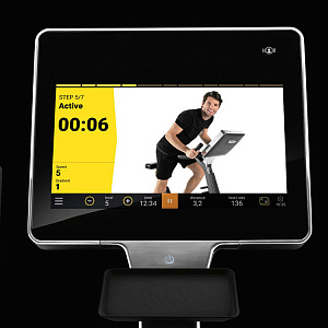 Вертикальный велотренажер Technogym Bike Personal Купить Вертикальный велотренажер Technogym Bike Personal в Москве